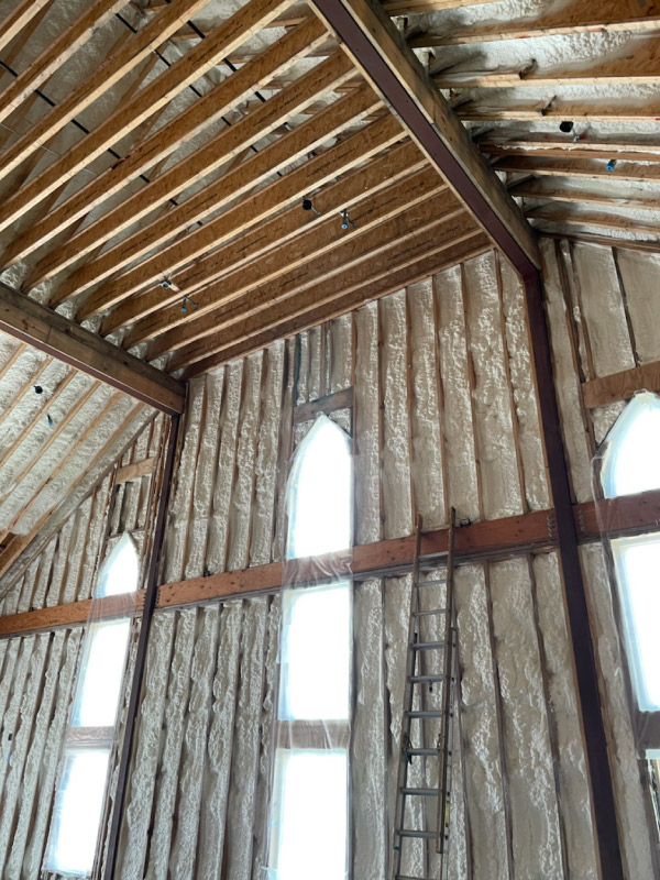 open cell spray foam insulation installed in a church